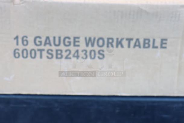 Brand new Regency 600TSB2430S 24"x30" 16-gauge stainless steel work table, 4" backsplash, undershelf; packaging damaged.