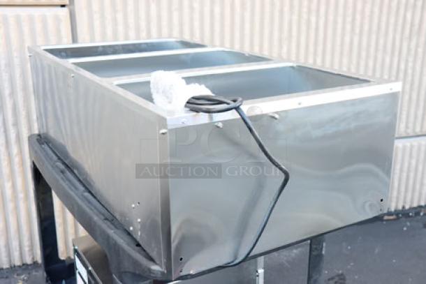 Brand new Avantco STE-3S three pan electric steam table with undershelf, 120V, 1500W, scratch-n-dent condition.