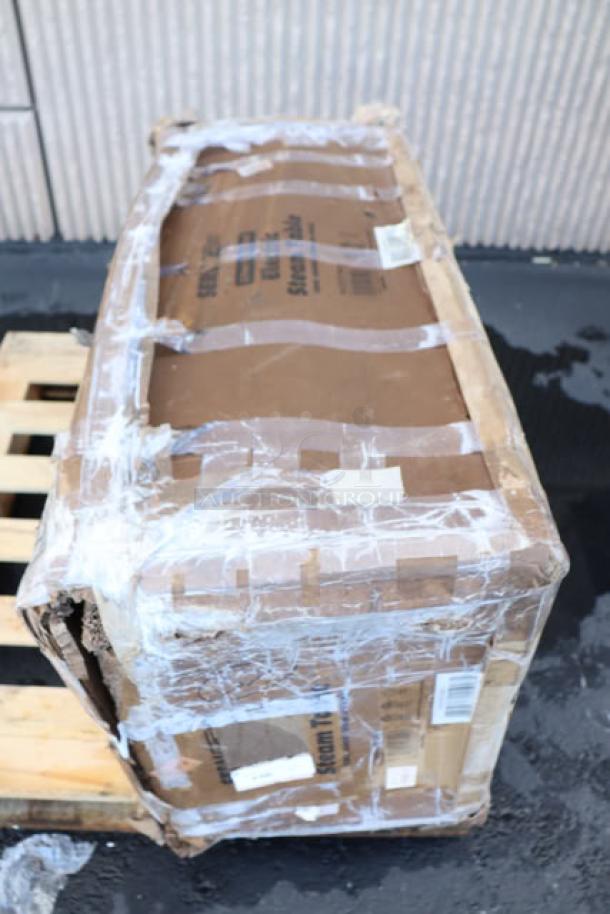 Damaged packaging of ServIt 423EST3WO Electric Steam Table, three-pan, 120V, 1500W, with adjustable undershelf, may have scratches and dents.