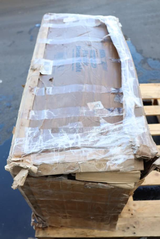 Damaged original packaging with visible tears and creases of a brand new ServIt 423EST3WO electric steam table, may have scratching and denting.