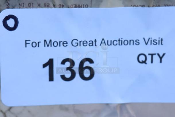 Label reading "For More Great Auctions Visit 136 QTY" on damaged packaging of ServIt 423EST3WO Electric Steam Table.