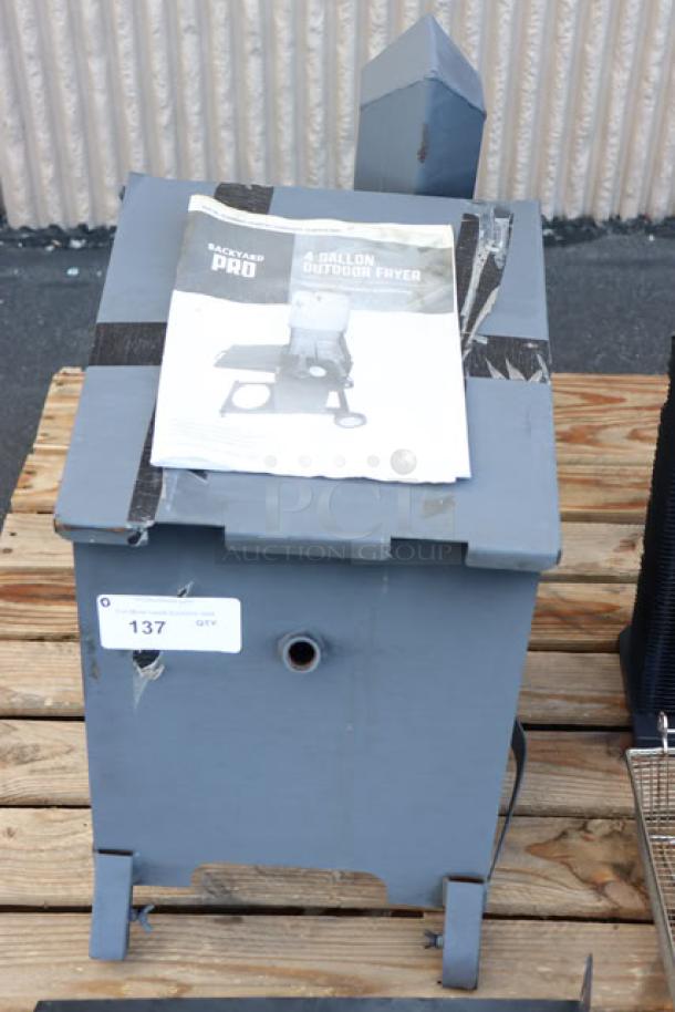 Backyard Pro BPM4G 4 Gallon Steel Liquid Propane Outdoor Deep Fryer, new condition, comes with manual and mobile stand.