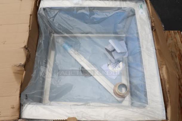 Regency 16-gauge stainless steel one compartment floor mop sink, model 600SM242412N, notched front, 24"x24"x12", in original damaged box.