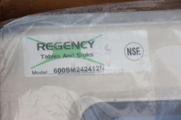Regency 16-Gauge Stainless Steel Mop Sink, Model 600SM242412N, in original box with damaged packaging.