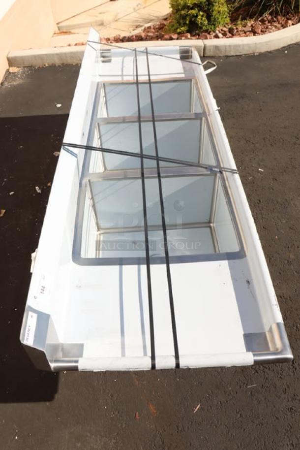 Regency 600S31824218 stainless steel sink, 94", three compartments, two drainboards, 16-gauge, minor scratches/dents.