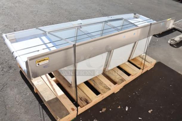 Brand new Regency 600S31824218 stainless steel commercial sink, three compartments, 94", with 2 drainboards. Possible minor scratches/dents.