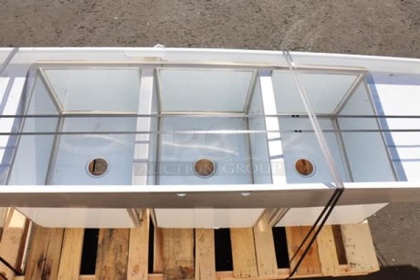 Brand new Regency 94" 16-gauge stainless steel three-compartment sink, model 600S31824218, with two drainboards.