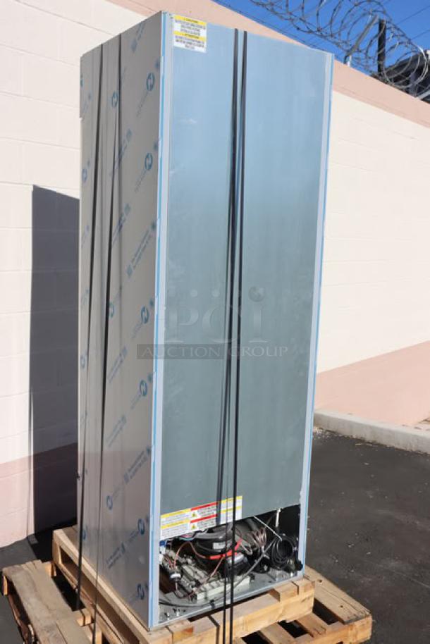 Brand new Beverage-Air RB19HC-1G glass door refrigerator in protective wrap on pallet, minor dents visible. Serial: 15202631.