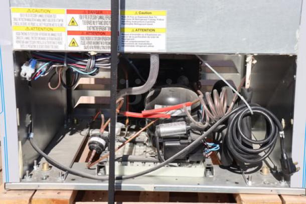 BRAND NEW Beverage-Air RB19HC-1G refrigerator interior wiring and components. Labels show caution and voltage details.