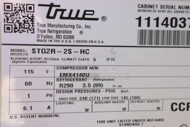 "True STG2R-2S-HC refrigerator label showing model, serial number 11140377, voltage, and refrigerant details."