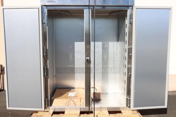 True STG2R-2S-HC refrigerator, 52 5/8" solid door, scratch-n-dent model, with heavy-duty PVC-coated wire shelves, commercial casters.