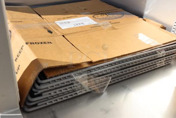 Brand new True STG2R-2S-HC refrigerator with PVC-coated wire shelves, commercial casters; scratch-n-dent condition.