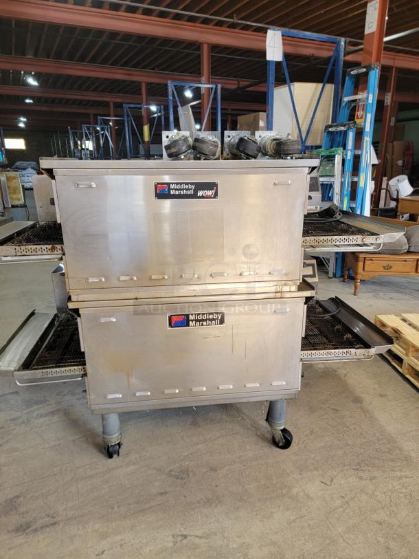 Middleby Marshall PS638G double stack gas conveyor oven, WOW! Series, for high-volume baking; shows logos and wheels.