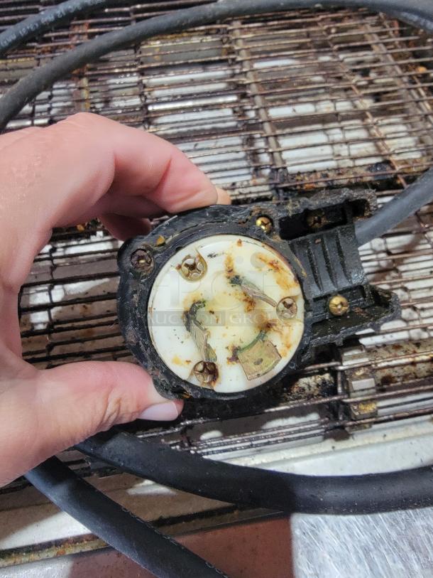 Old, used conveyor oven component, with visible electrical connections and grime, possibly from a Middleby Marshall PS638G.