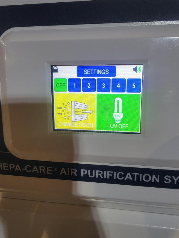 Abatement Technologies HC800FUV air purifier screen displaying settings and filter change notification.