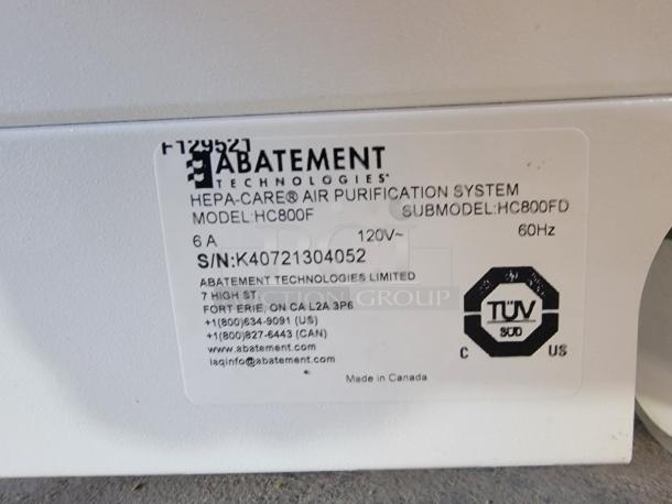 Abatement Technologies HEPA-CARE HC800FUV label showing model, serial number, and certification details.