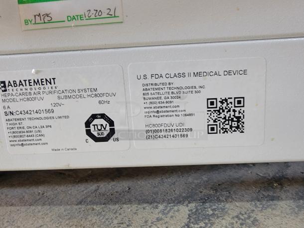 Abatement Technologies HC800FUV air purifier label showing model details, compliance markings, and manufacture info.