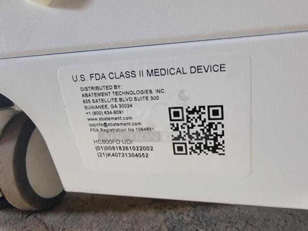 Abatement Technologies HC800FUV air purifier label, noting U.S. FDA Class II medical device; includes QR code and contact info.