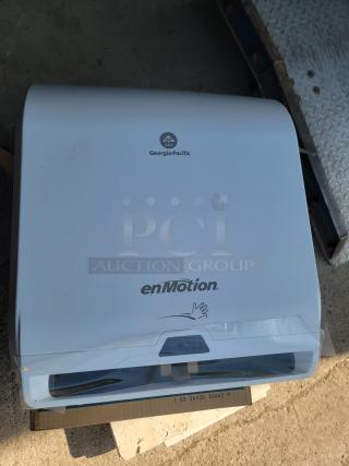 Brand new Georgia-Pacific enMotion Paper Towel Dispenser, model 59407A. Touchless design, ideal for hygiene in restrooms.