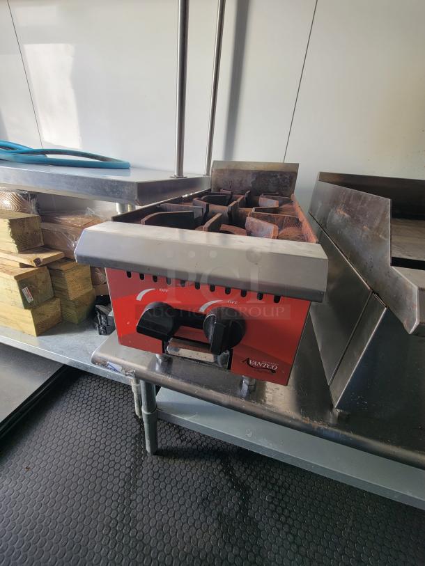 Anets SLG40 fryer in a 2021 mobile food trailer by Covered Wagon Trailers, fully equipped with commercial kitchen appliances.