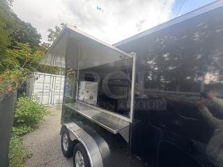 2021 Covered Wagon 16' mobile food trailer with side serving window. Features full commercial kitchen setup, ready for use.