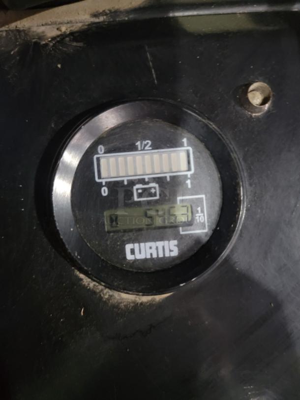 Hour meter showing 546 hours on Dayton 55PD64 electric pallet jack. Curtis brand meter visible. Pallet jack not operational.