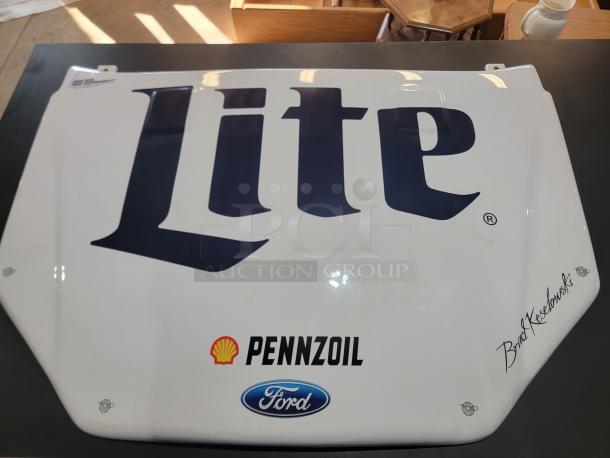 Rare Brad Keselowski signed NASCAR hood, featuring Miller Lite, Pennzoil logos, and Ford Fusion style. Blue Deuce livery.