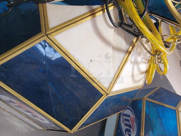 Vintage Miller Lite Tiffany-style stained glass pendant lights with brass-tone frames. Two in excellent condition, two with visible damage.