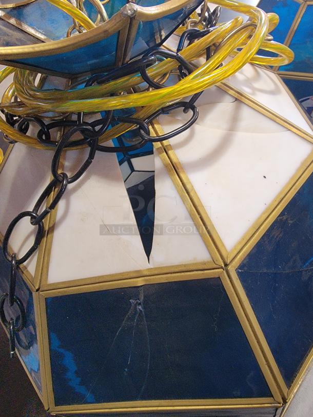 Vintage Miller Lite Tiffany-style bar light with blue and white stained glass, brass-tone frame, and visible glass damage.