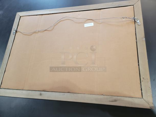 Back of a large Guinness pub mirror, 40"x29", with a wooden frame and attached hanging wire.