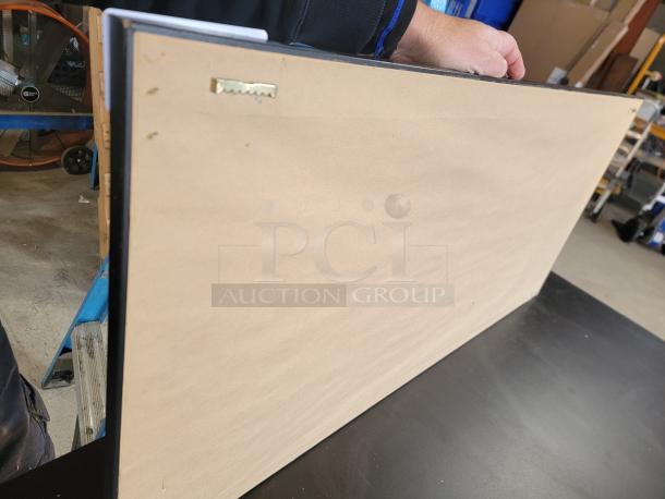 Back view of the framed 2007 Red Sox World Series panoramic. Features secure hanging hardware on a sleek black frame.