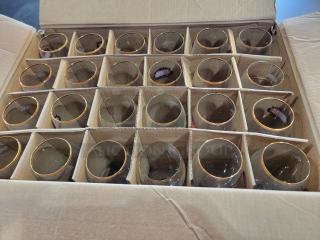 24-pack Stella Artois Belgium Chalices, 40cl each, featuring gold rims and star stems, in original packaging.