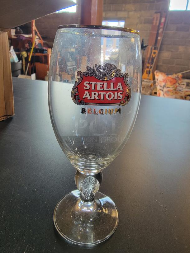 Stella Artois Belgium Chalice, 40cl glass, gold rim, star stem, iconic logo. Ideal for elevating home bar experience.