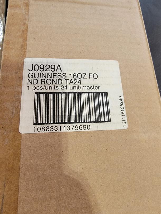 Cardboard box with label: "J0929A Guinness 16oz Round T24," includes barcode and quantity info.