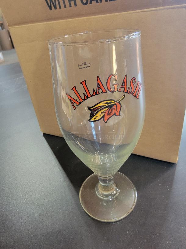 Set of 6 Allagash Brewing pint glasses with logo and leaf design, excellent condition, in original storage box.