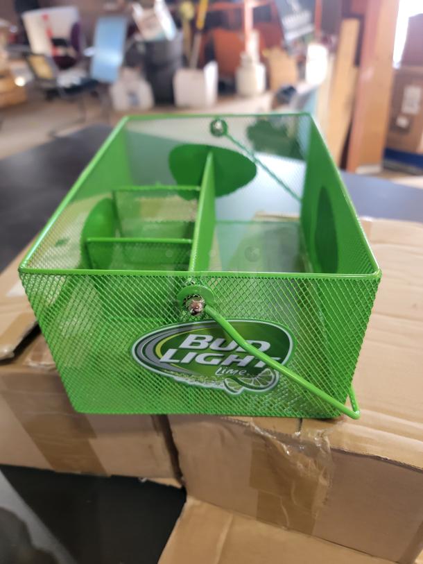 Set of 2 lime-green Bud Light Lime bar caddies, metal mesh, brand new, featuring the Bud Light Lime logo.