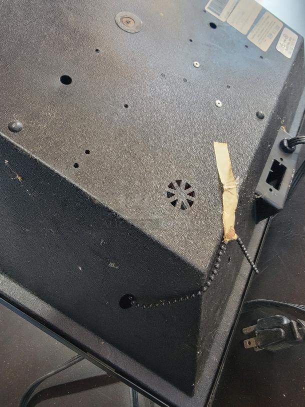 Back view of a Budweiser American Ale lighted sign from 2008 by Grimm Industries. Black casing, tested and working condition, features a power cord and chain switch.