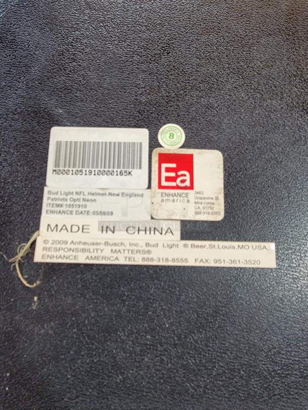 Label on Bud Light NFL New England Patriots neon sign, Enhance America, Made in China, 2009.