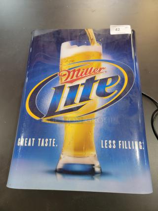 Vintage Miller Lite backlit bar sign from 2008, 3D design, 23" x 3" x 29". Lights non-functional, physical condition good.