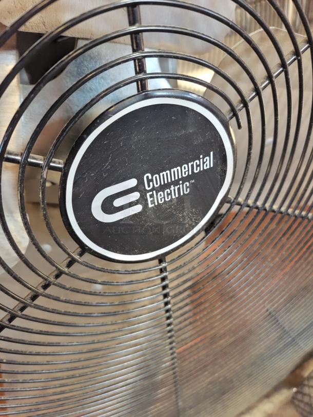 Commercial Electric 30" drum fan in orange steel housing with durable grille. Model E29066. Tested, working condition.