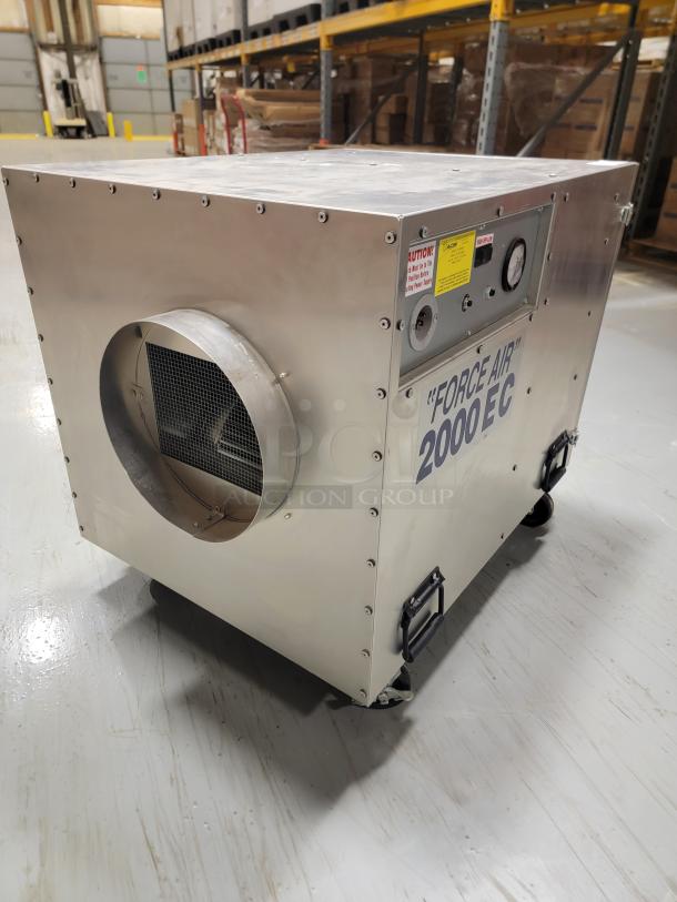 ACSI Force Air 2000 EC Negative Air Machine with aircraft-grade aluminum housing, HEPA filter, pressure gauge, and casters.