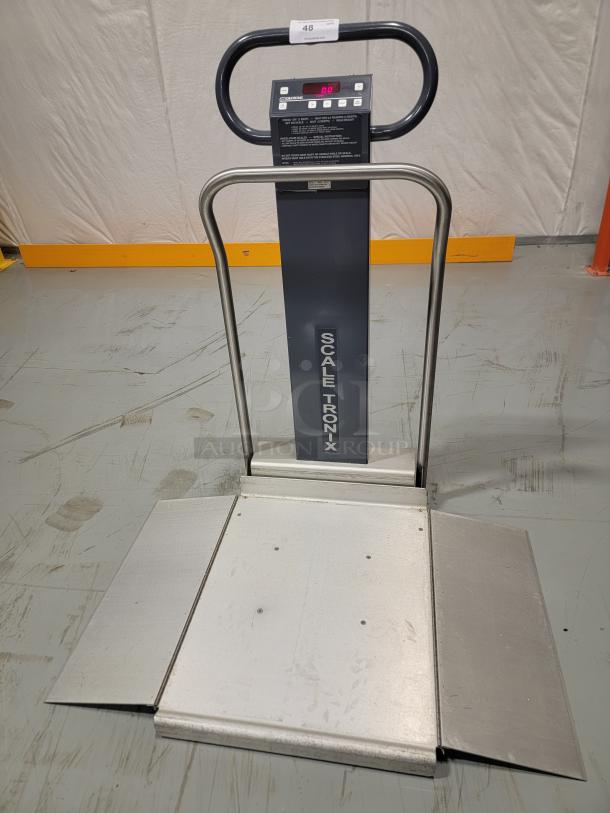 Scale-Tronix 6002 portable scale with low-profile platform, integrated ramps, and digital readout. Tested and working.