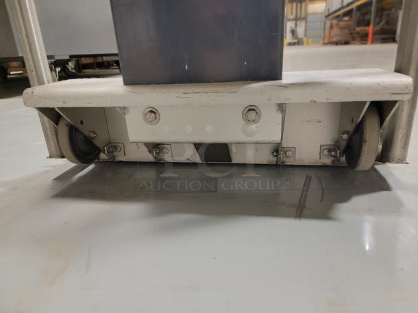 Scale-Tronix 6002 portable medical scale base, showing wheels for easy transport. Durable heavy-duty design, ideal for versatile patient care.