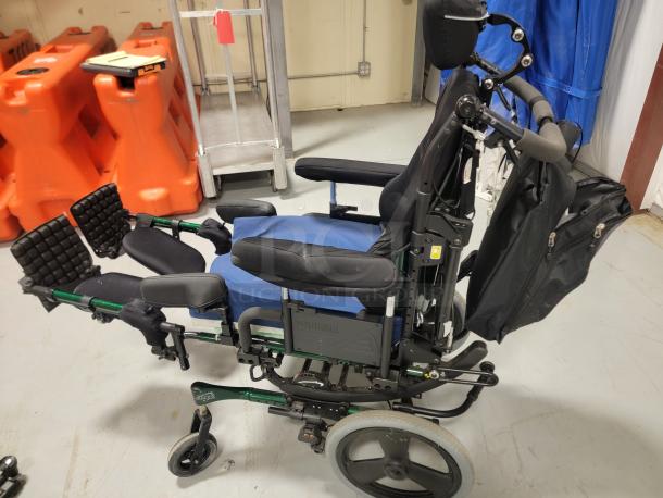 Premium Quickie IRIS tilt-in-space wheelchair, excellent condition, JAY contoured backrest, pressure-relieving cushion, elevating legrests.