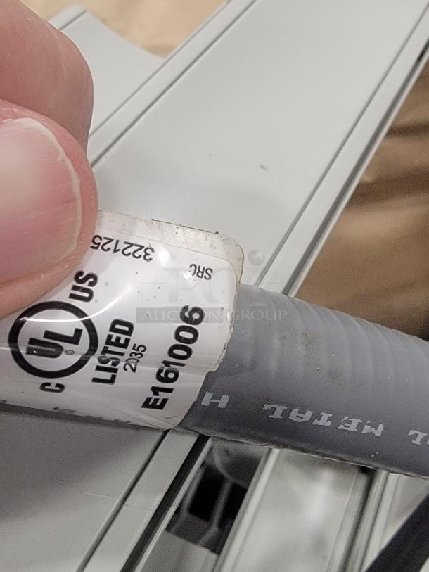 UL certification label on AIS cubicle component, marked "E161006" and "LISTED 2035", indicating compliance with safety standards.