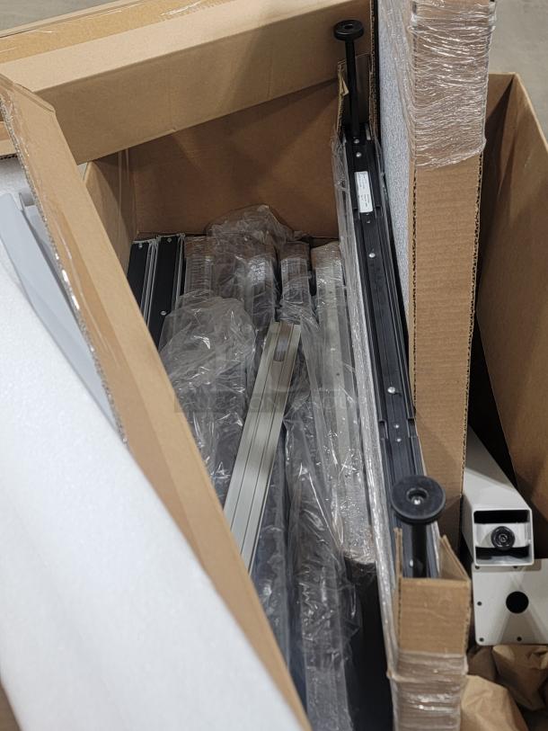 Set of 5 AIS Matrix 6'x6' cubicles in box, featuring glass panels and height-adjustable tables, like new.