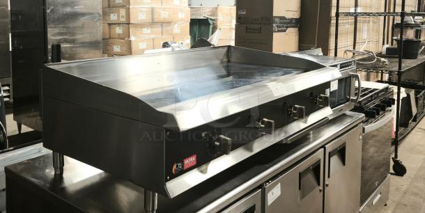 Brand new Cooking Performance Group Ultra Series 48" chrome-plated, 4-burner LP gas griddle, 120,000 BTU, model 351gtucpg48l.