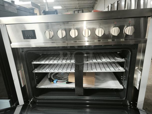 Brand new KoolMore 36-Inch Professional All-Electric Range, model KM-FR36EE-SS, with stainless steel finish and control knobs.