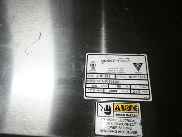 Henny Penny AHC-993 humidified heated pass thru holding cabinet, model AHC-993, 120V, new condition, with safety label.