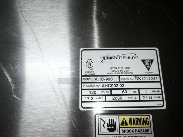 Henny Penny AHC-993 humidified heated pass-thru holding cabinet, 120V, serial DK1211241, 2080 watts, in new condition.